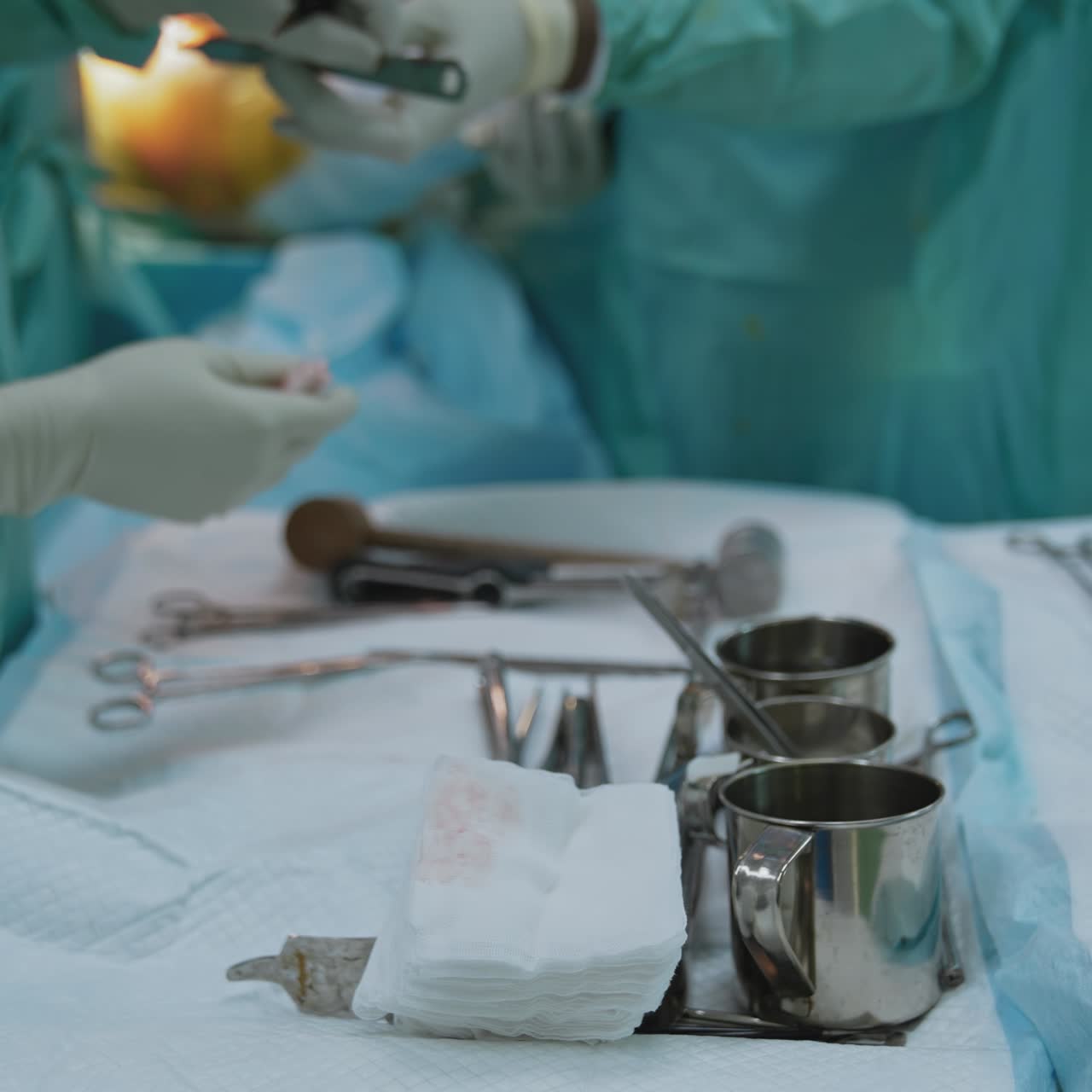 Modern equipment in clinic. Professional surgeons with instruments performing operation in clinic, close up
