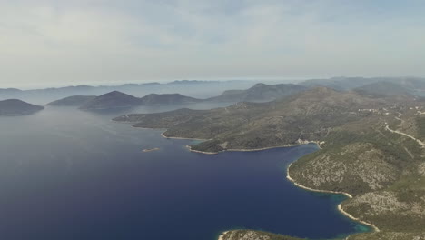 Flight-over-desert-islands-and-colorful-sea,-Brijuni-park,-Croatia