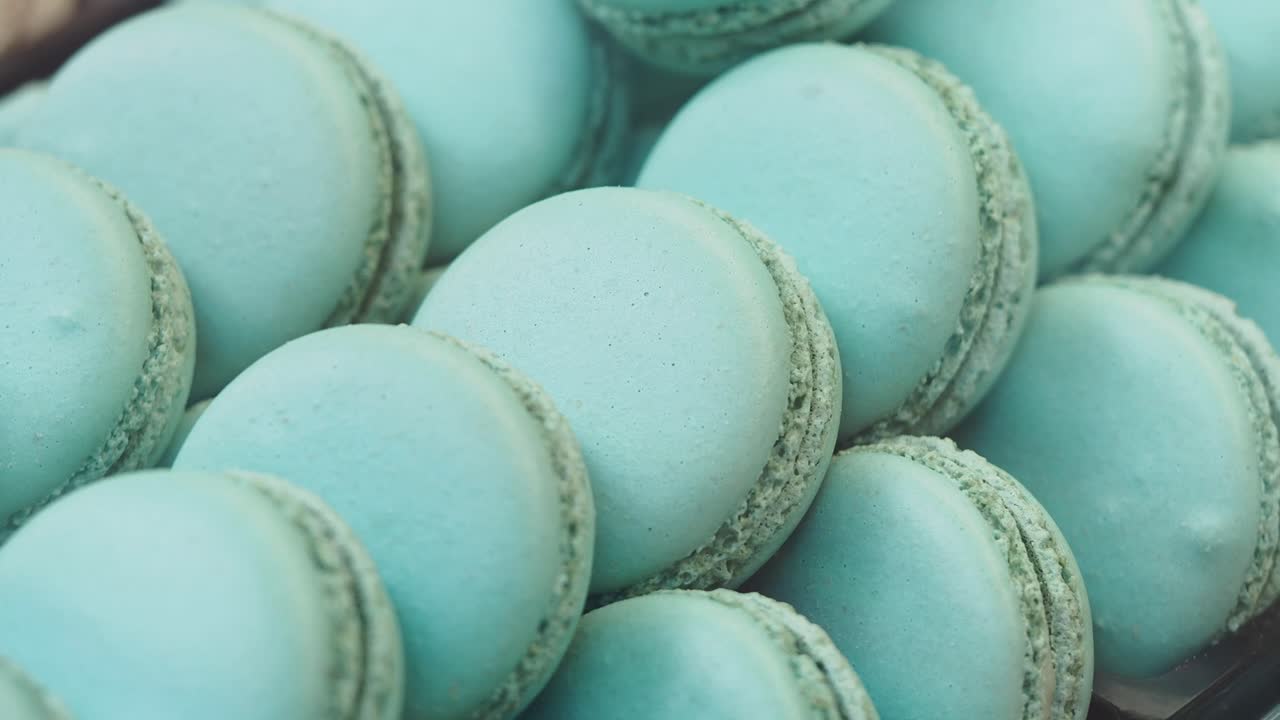 Close-up of Light Blue Macarons Arranged in Rows