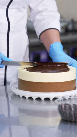 pastry chef cooking sweet dessert. delicious cakes making in bakery. vertical video