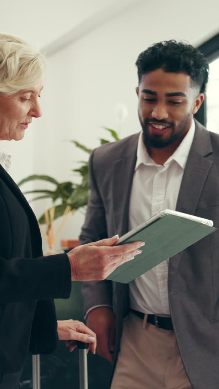 Professional Business People Shaking Hands and Using Tablet