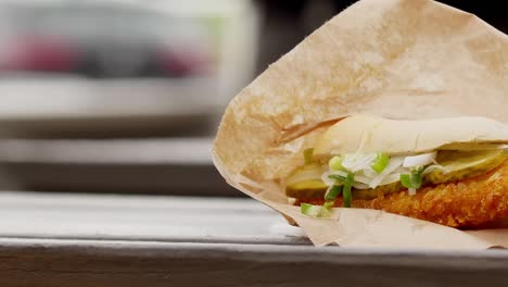 Slow-moSlow-moving-shot-of-a-delicious-fried-fish-roll