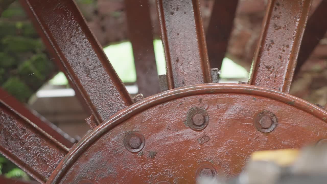 SLOW MOTION SHOT OF A WATER MILL