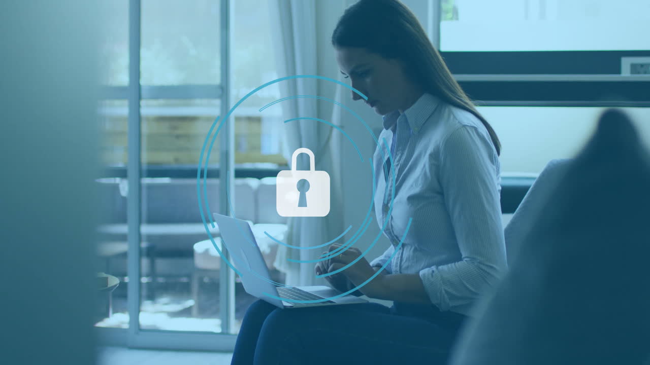 Woman using laptop at home with digital padlock security animation overlay