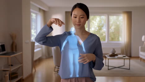 woman interacting with a holographic body scan