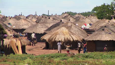 longshot of a traditional village or refugee camp in northern uganda