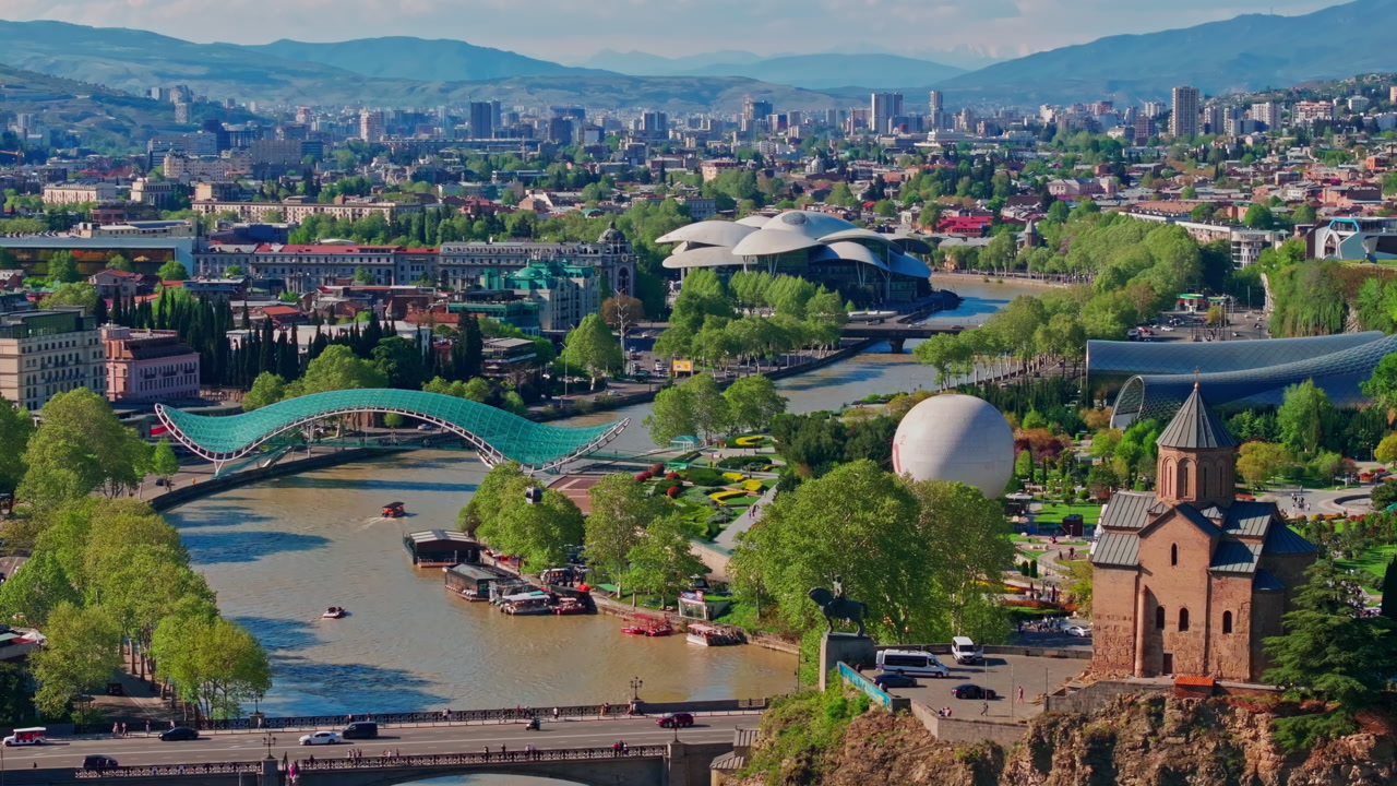 Aerial perspective of downtown Tbilisi, revealing the vibrant heart of Georgia’s capital with detailed city patterns, architecture, and lively urban structure.