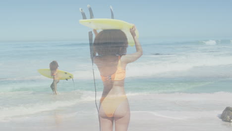 animation of biracial female surfer over female surfer at beach