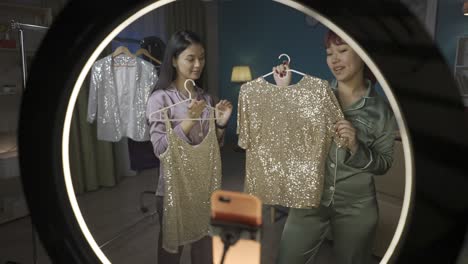 fashion review: two friends try on glittery tops