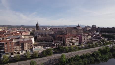 traffic flow on road next to tagus river, talavera de la reina, toledo, spain
