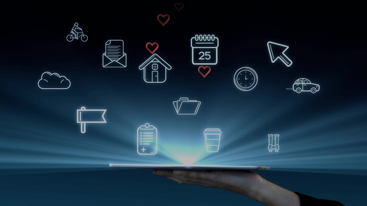 Pink hearts and multiple digital icons over hand holding a digital tablet against blue background