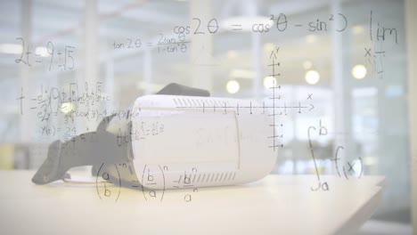 ecuaciones matemáticas flotando contra el auricular vr en una mesa de madera