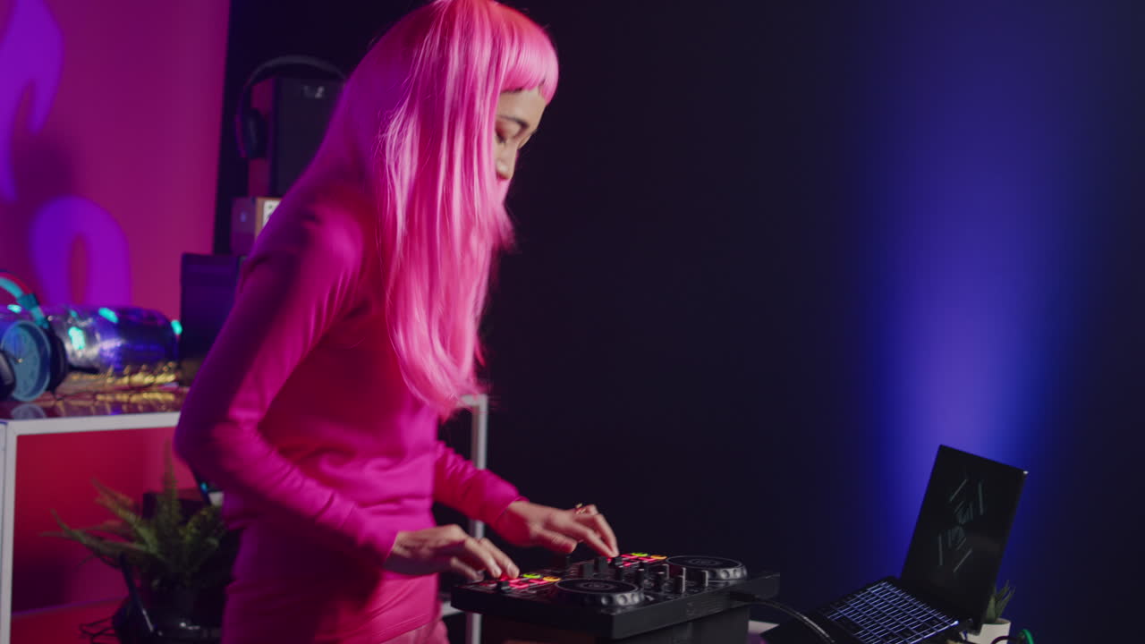 DJ with Pink Hair Mixing Music