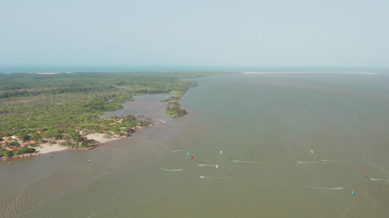 Aerial View of Kitesurfing on a Tropical Coastline