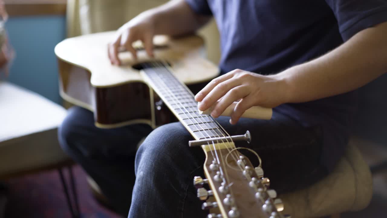 Playing an Acoustic Guitar