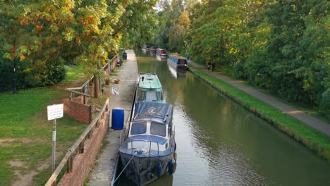 a longboat parked on a canal in oxford, uk