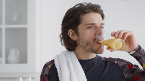 man drinking juice