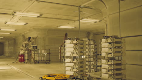 a server room with rows of servers and networking equipment