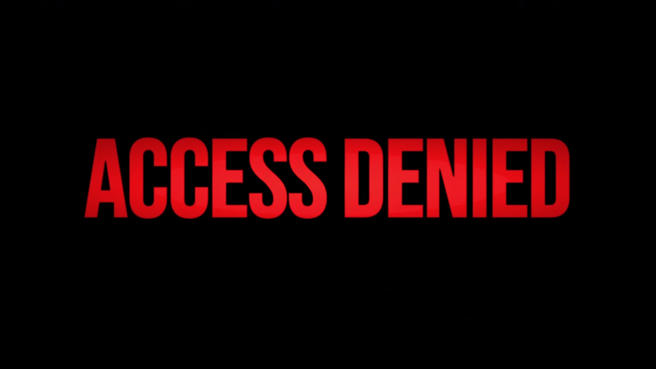 A flashing text message, red condensed characters appearing and disappearing over a black background: Access Denied