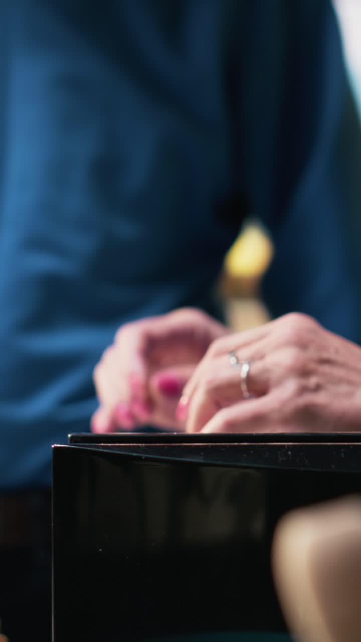 Vertical Video Retired couple preparing breakfast with toast from the toaster