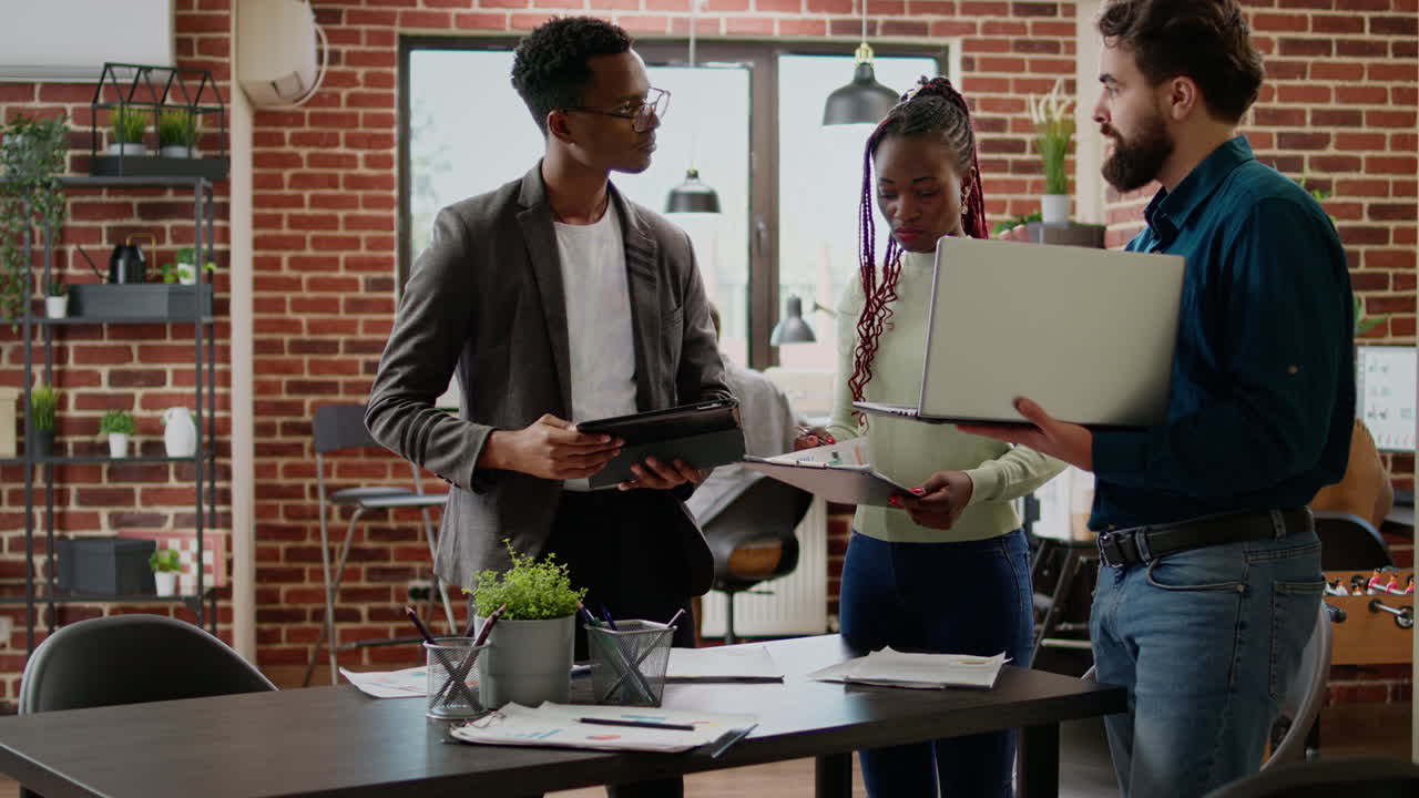 Business people analyzing charts analysis on papers