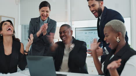 successful and diverse business team celebrating achievement