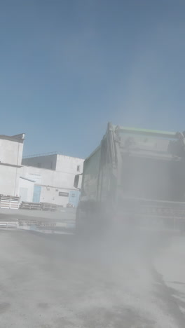 garbage truck at industrial facility
