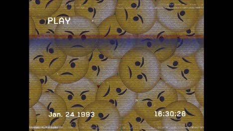 animación digital del efecto de falla de vhs sobre múltiples emojis de cara enojada en un fondo negro