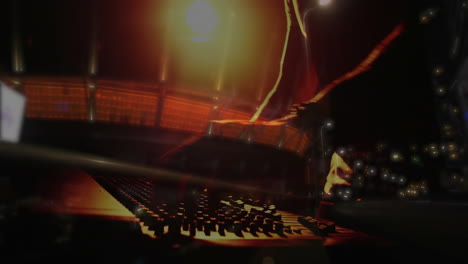 hands typing on keyboard with digital data processing animation over dark background