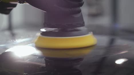 Close-Up-Shot-Of-Polisher-Machine-Removing-Scratches-From-Car-Hood