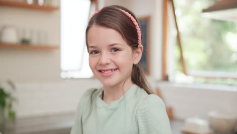 Happy,-morning-and-face-of-a-child-in-the-kitchen