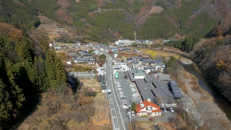 drone flight over rural village in japanese mountains