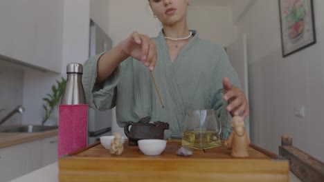 woman performing a tea ceremony
