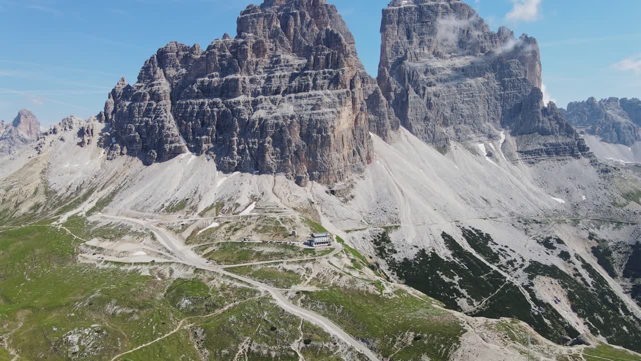 Stunning summer of Tre Cime di Lavaredo mountain hut nestled, Italian Dolomites