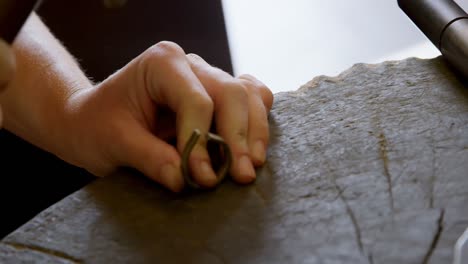 jewelry designer working in workshop 4k