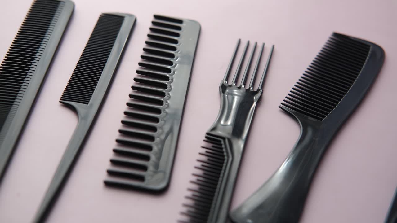 Overhead view of professional combs on  background ,