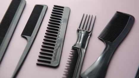 Overhead-view-of-professional-combs-on--background-,