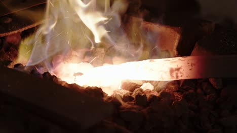 moulting metal in fire forge