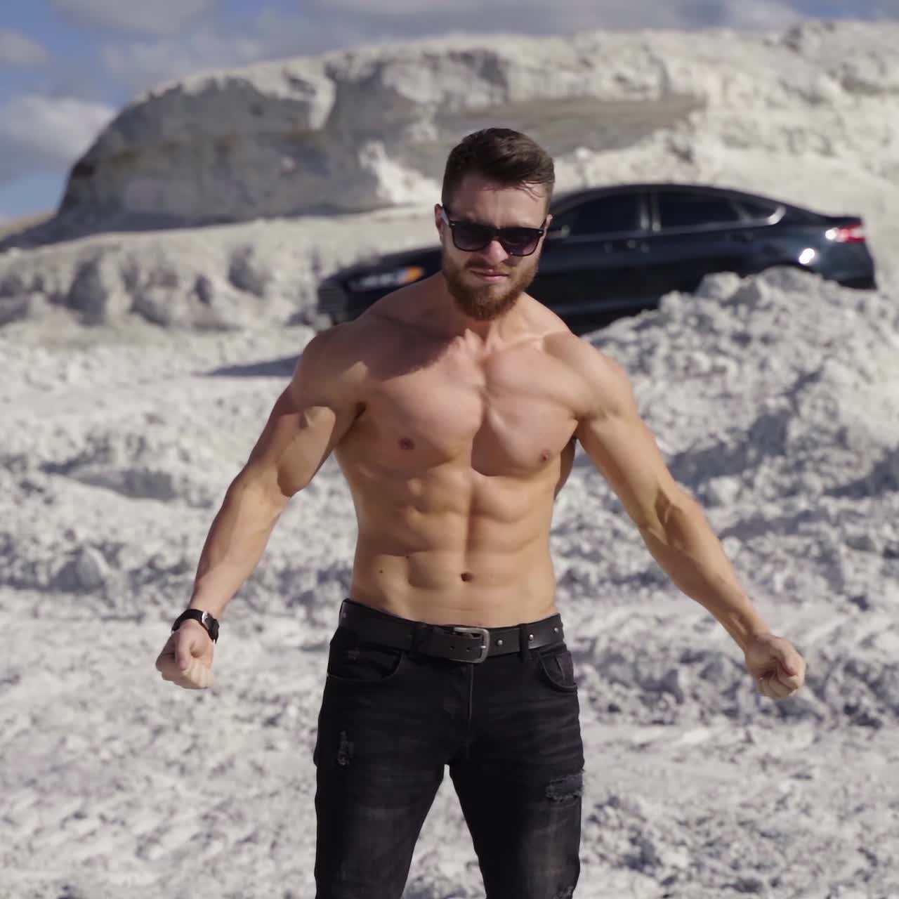 Young muscular bearded man