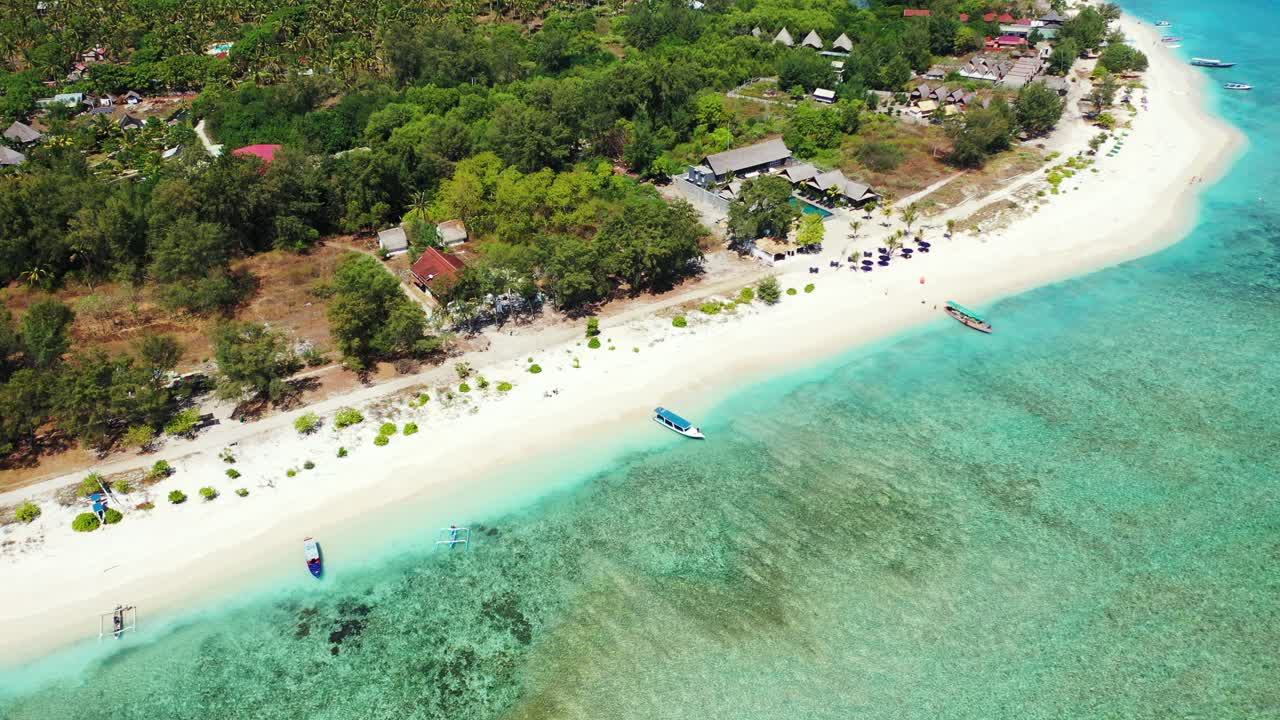 Beautiful Scenery Of Lush Green Island With White Sand, Green Trees and Different Houses That Surrounded By Clear Green Sea, Maldives - - Aerial Shot