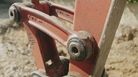 close up shot of a connection joint on a mini excavator