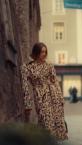 woman in a leopard print coat