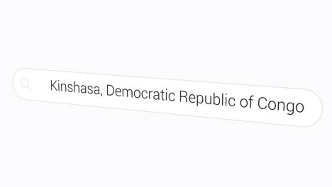 Explorando-Kinshasa,-Ciudad-Capital-De-La-República-Democrática-Del-Congo,-Escribiéndola-En-La-Barra-De-Búsqueda