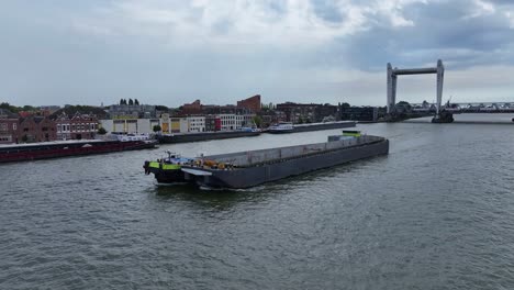 container barge near the port of dordrecht