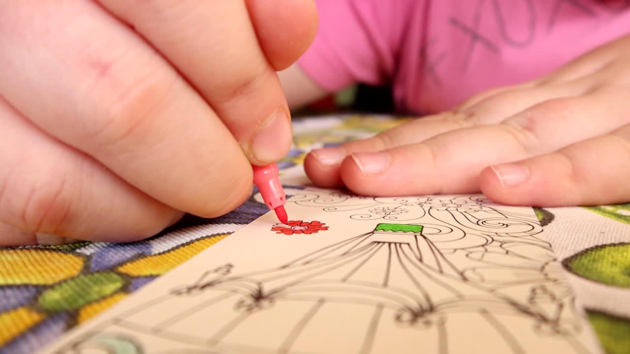 Child coloring a drawing