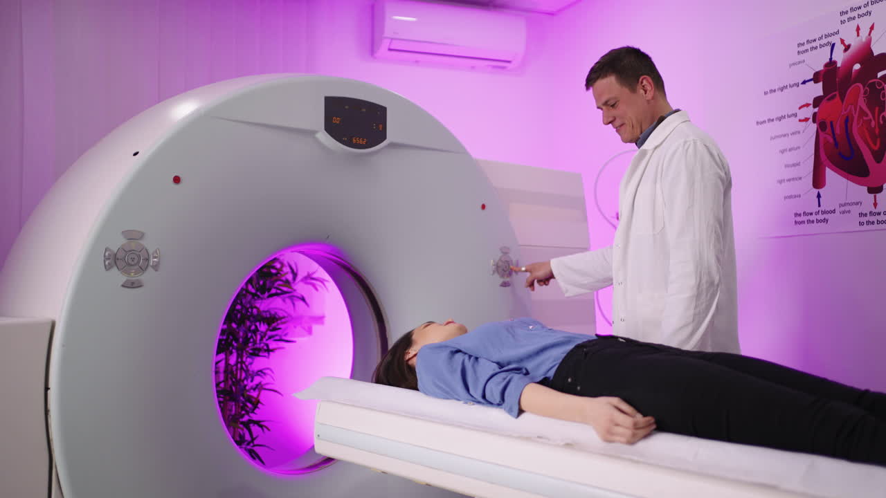 Doctor preparing a patient for a medical imaging scan