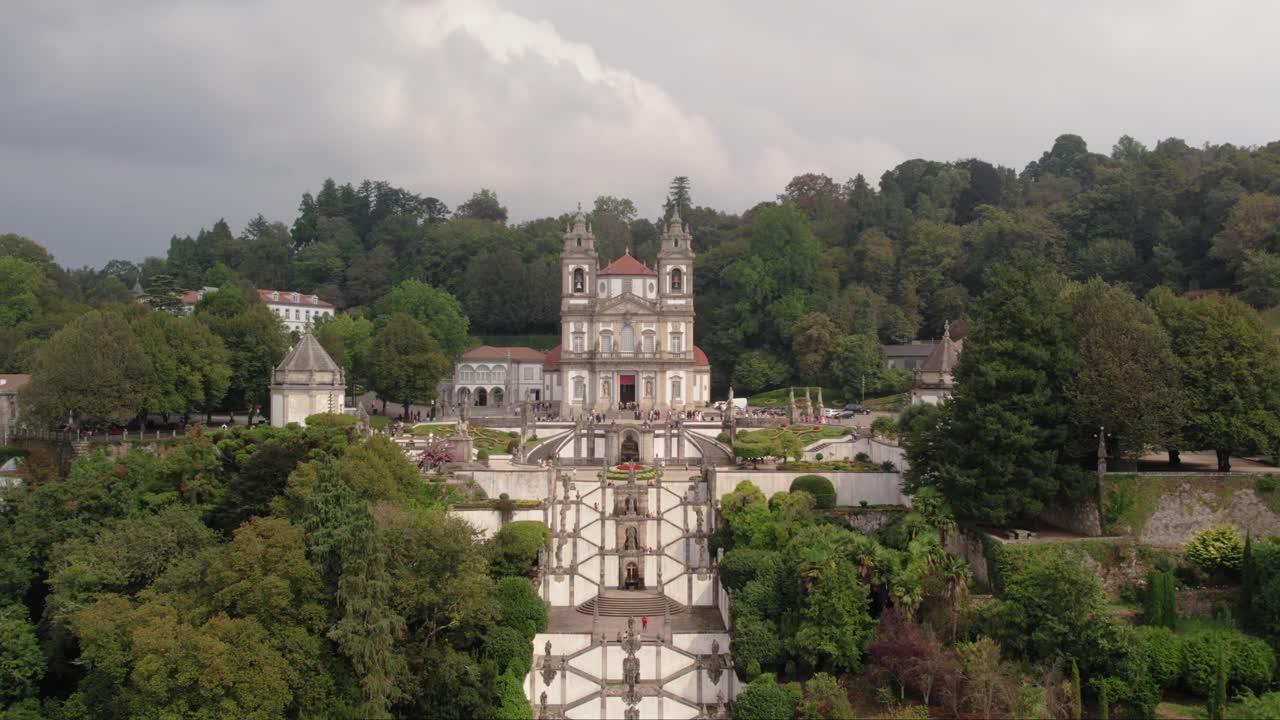 Aerial fly out - Bom Jesus do Monte staircase and sanctuary in Braga Portugal