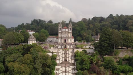 aerial fly out - bom jesus do monte staircase and sanctuary in braga portugal