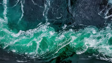 waves of water of the river and the sea meet each other during high tide and low tide.