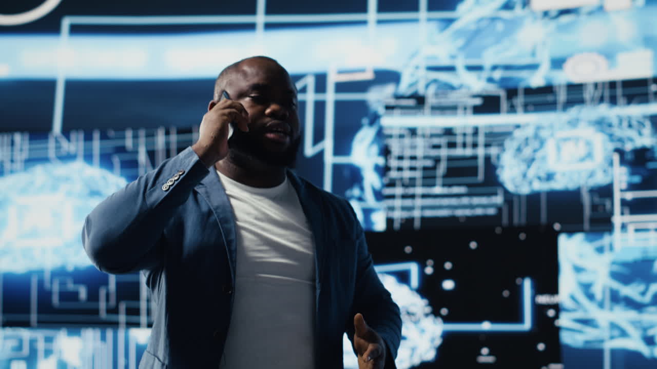 African american IT expert answers phone call to discuss deep learning